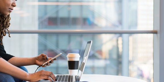 Woman Near Window Typing